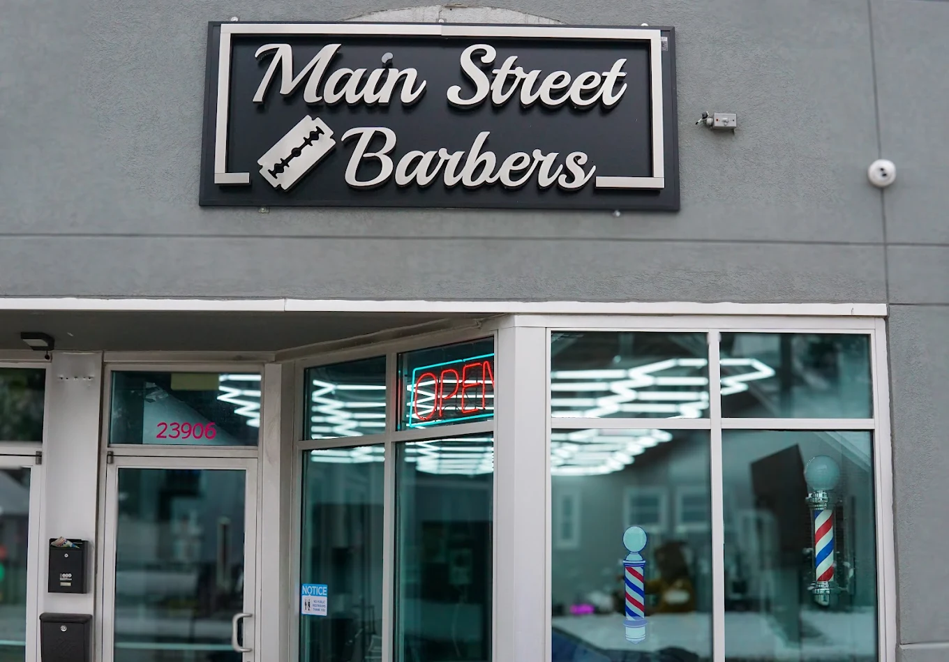 Main Street Barbers sign outside the shop